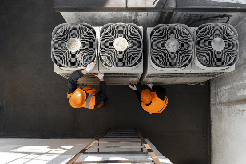 Technician is checking air conditioner